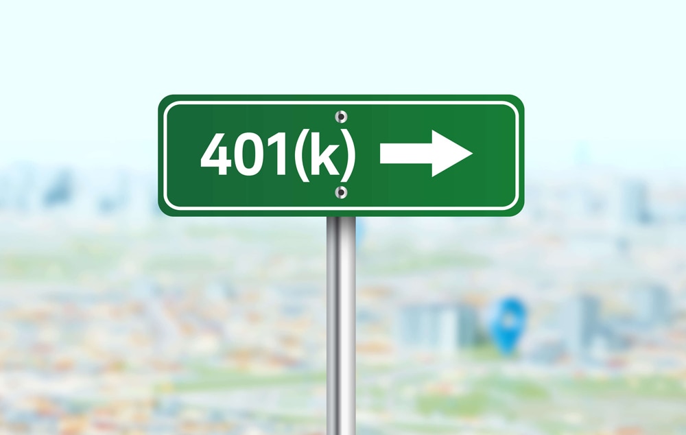 Road sign with 401(k) and an arrow pointing to the right on it